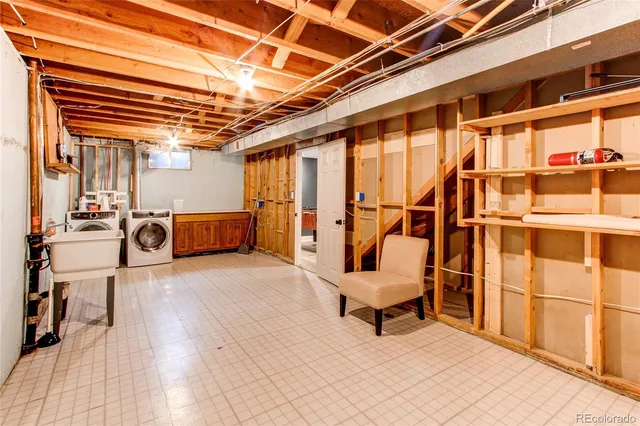 a view of a patio with table and chairs