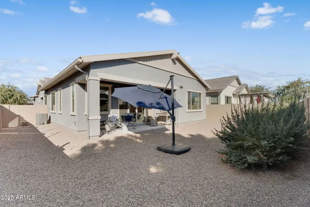a house view with a outdoor space
