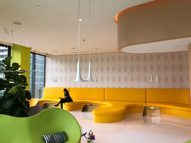 a view of a swimming pool with a lounge chairs