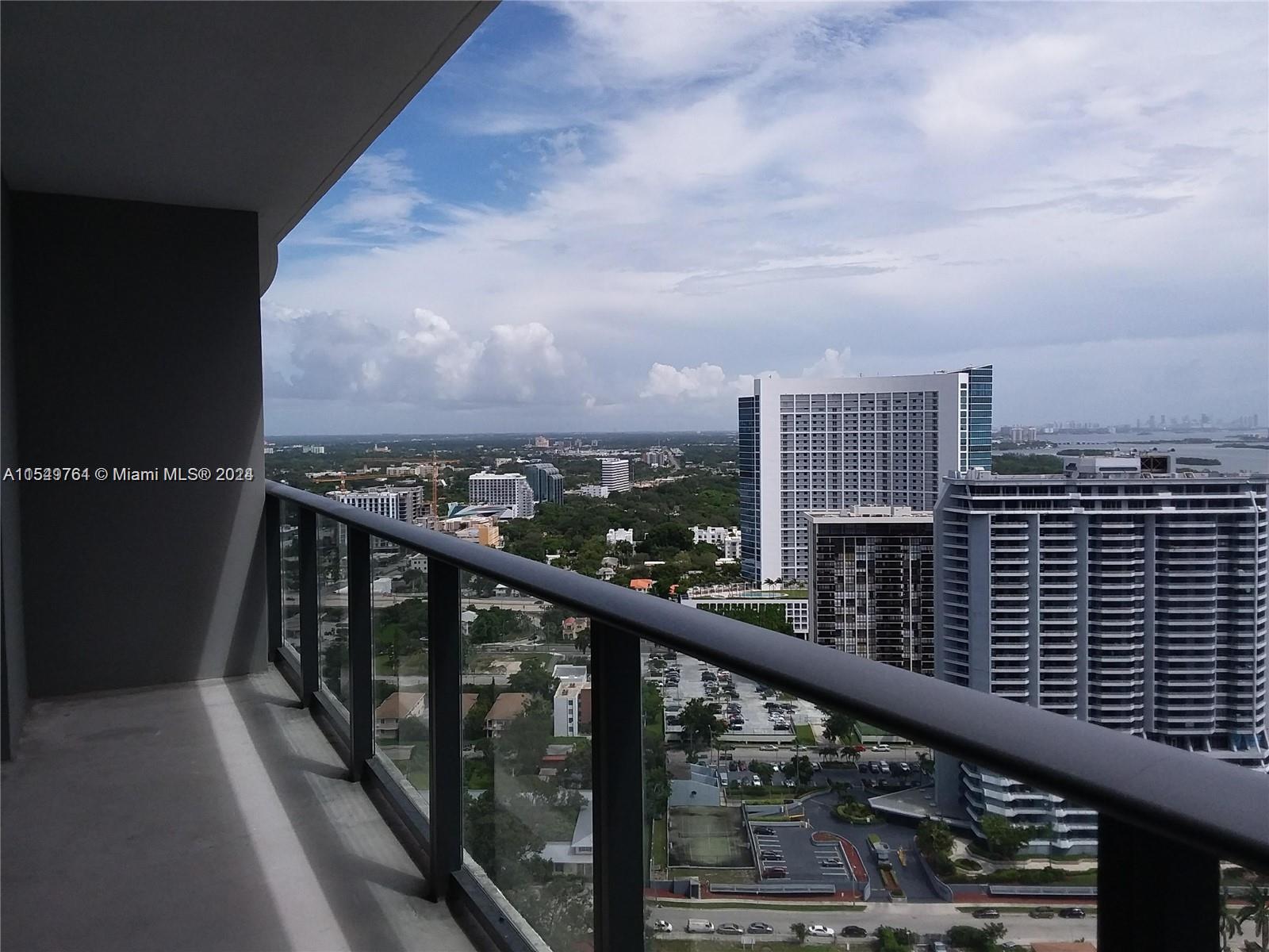 501 Northeast 31st Street, Unit 3003 Miami, FL 33137 - Photo 3 of 28 a city view from a balcony