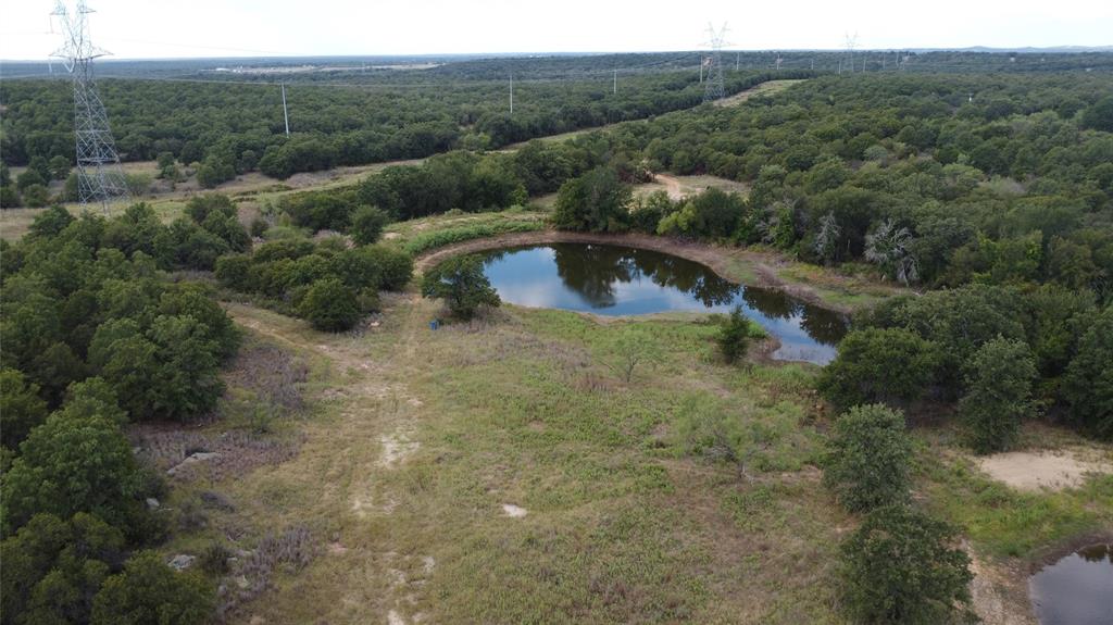 1685 Rocky Mound Road Graham, TX 76450 - Photo 11 of 39 a view of a dry yard with green space