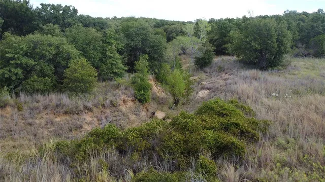 a view of a car park in front of house