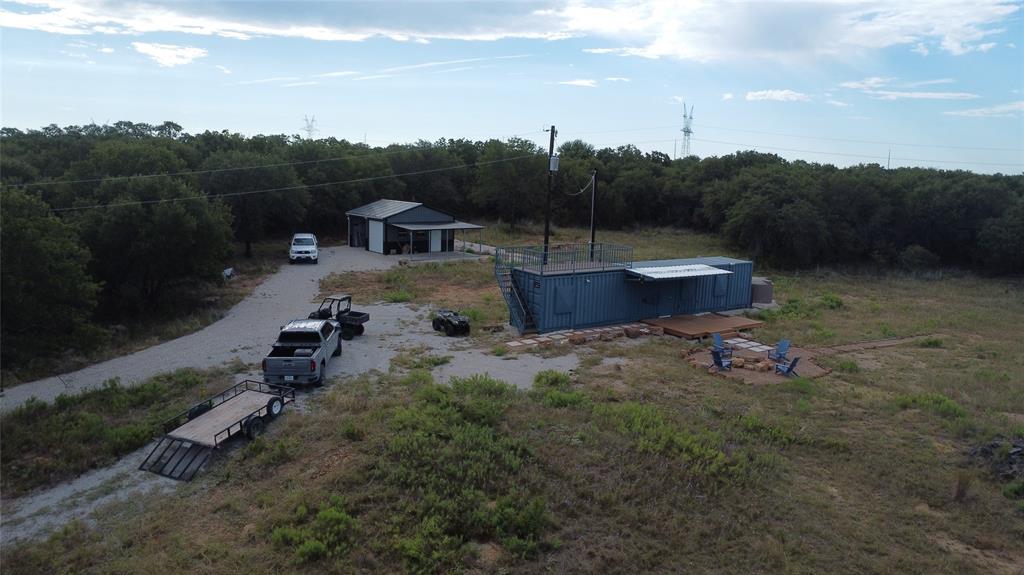 1685 Rocky Mound Road Graham, TX 76450 - Photo 29 of 39 an aerial view of a house with pool garden in the back