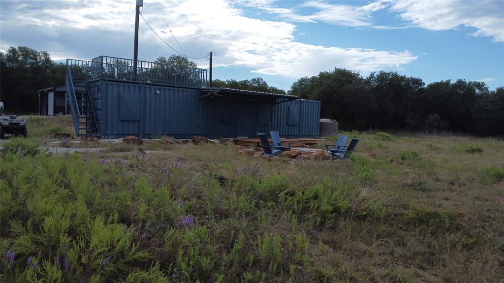 1685 Rocky Mound Road Graham, TX 76450 - Photo 6 of 39 a backyard of a house with table and chairs