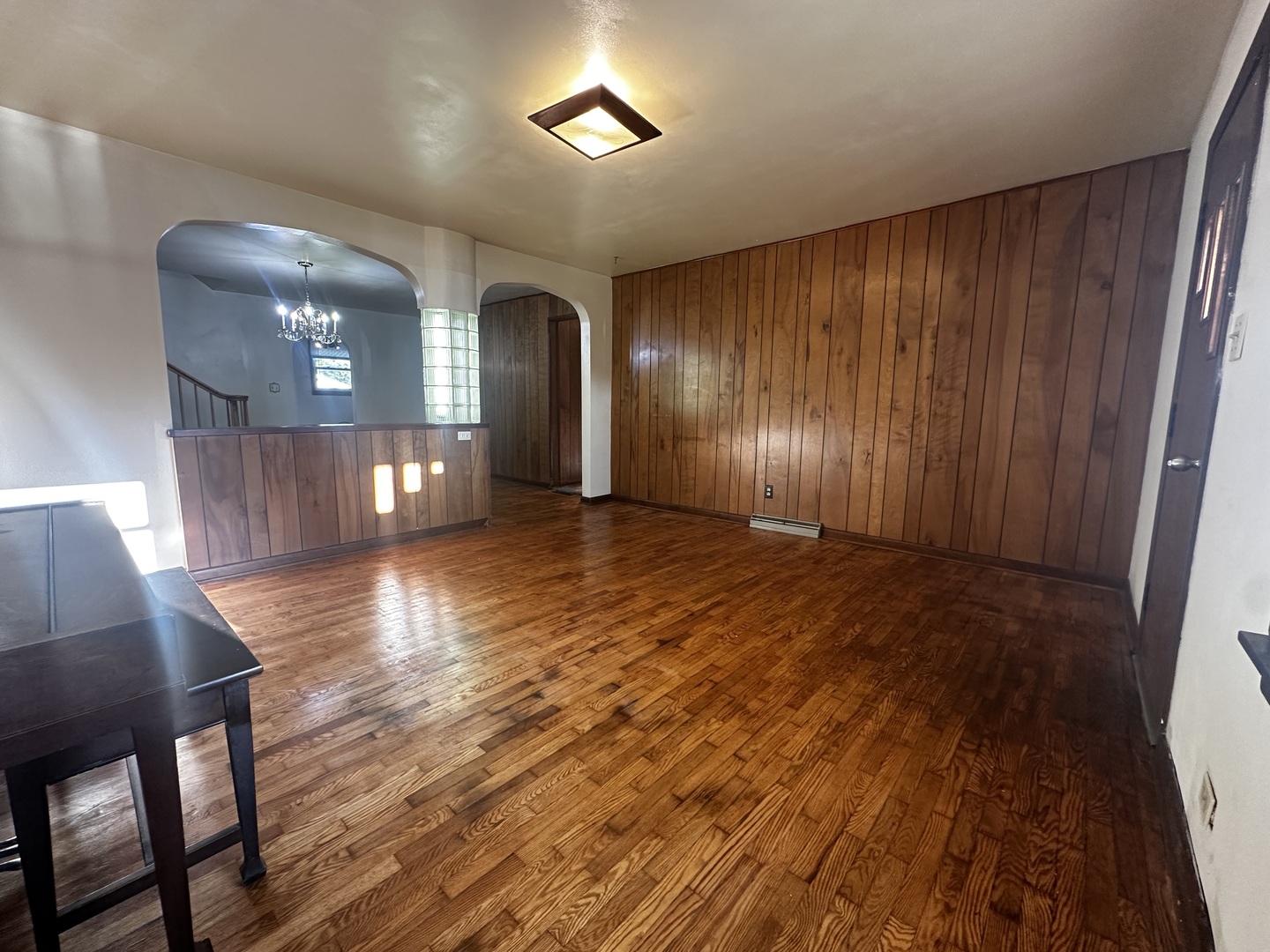 213 North Peoria Street Gilman, IL 60938 - Photo 11 of 44 a view of a livingroom with wooden floor