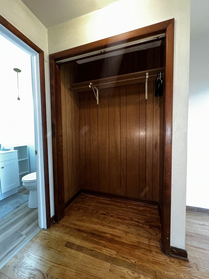 213 North Peoria Street Gilman, IL 60938 - Photo 22 of 44 a view of a room with wooden floor and bathroom