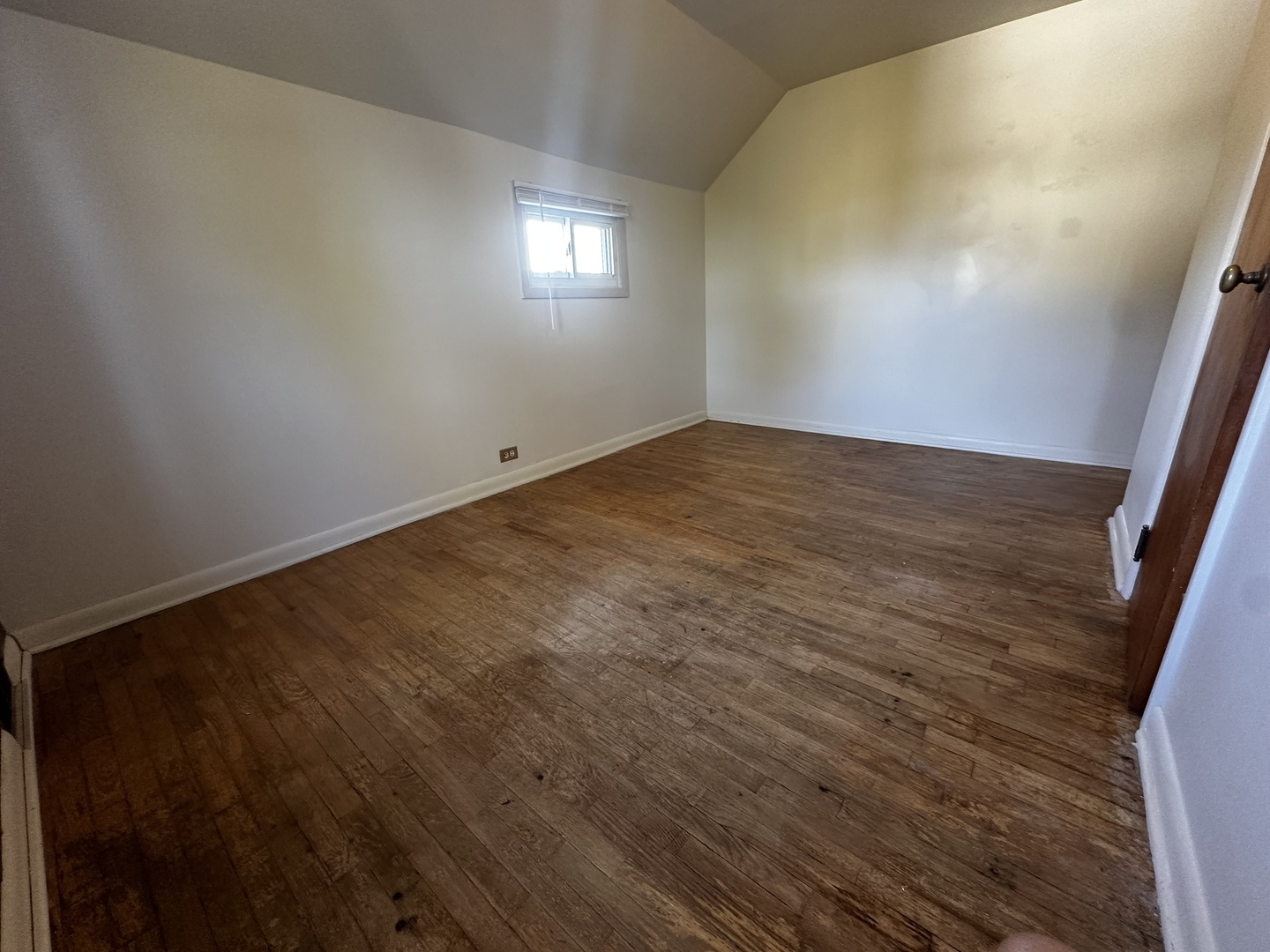 213 North Peoria Street Gilman, IL 60938 - Photo 40 of 44 a view of empty room with wooden floor and fan