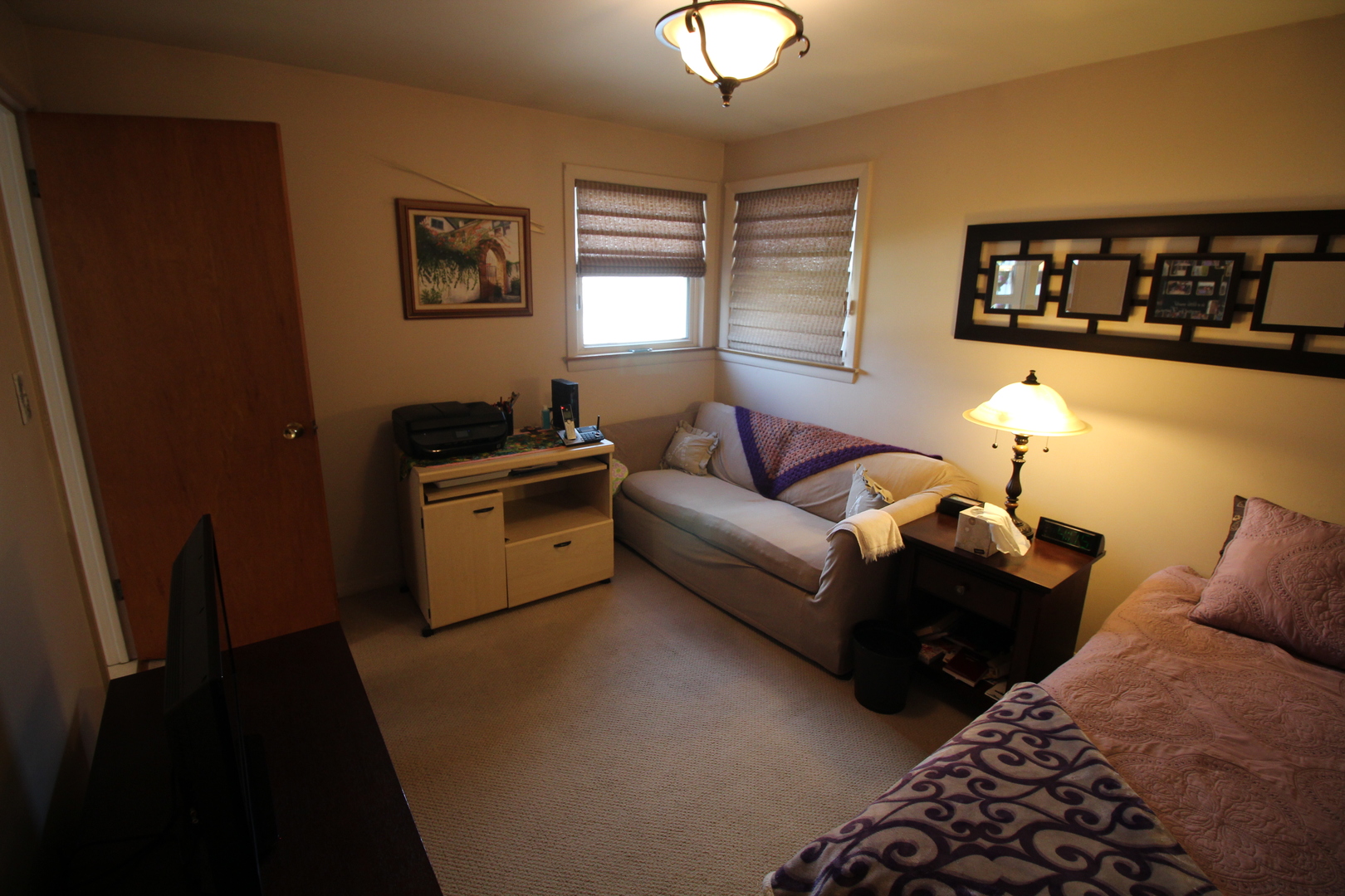 Undisclosed Address Chicago, IL 60638 - Photo 19 of 20 a living room with furniture and painting on the wall