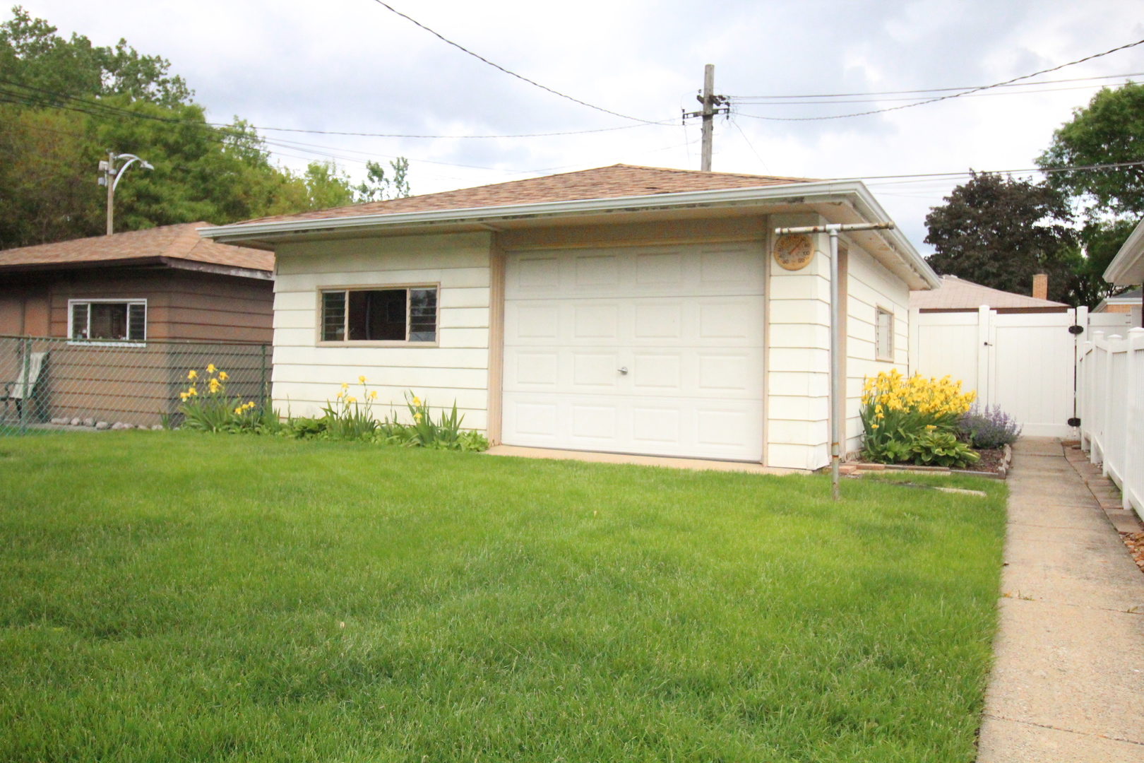 Undisclosed Address Chicago, IL 60638 - Photo 3 of 20 a view of a house with a yard