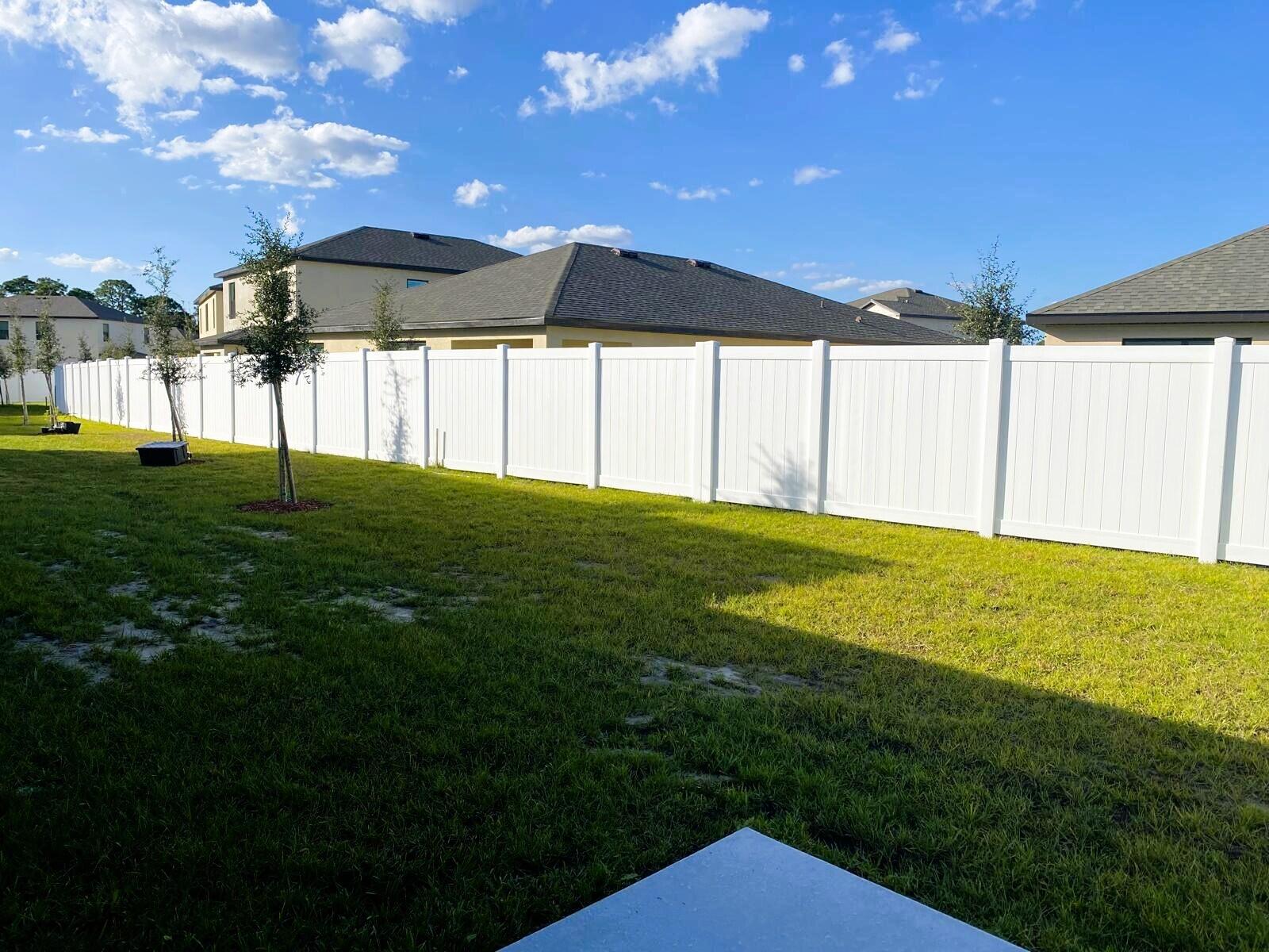 9622 Seaspray Drive Fort Pierce, FL 34945 - Photo 28 of 32 a view of a house with a big yard