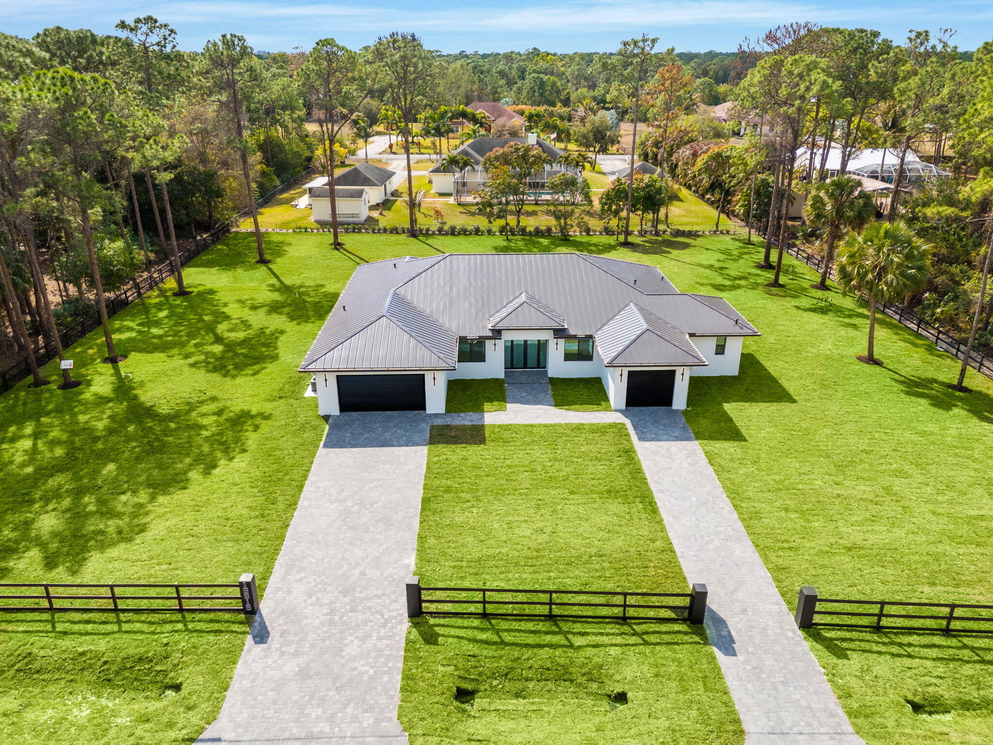 16818 78th Road North The Acreage, FL 33470 - Photo 4 of 75 79-web-or-mls-DJI_20260211111635_0860_D