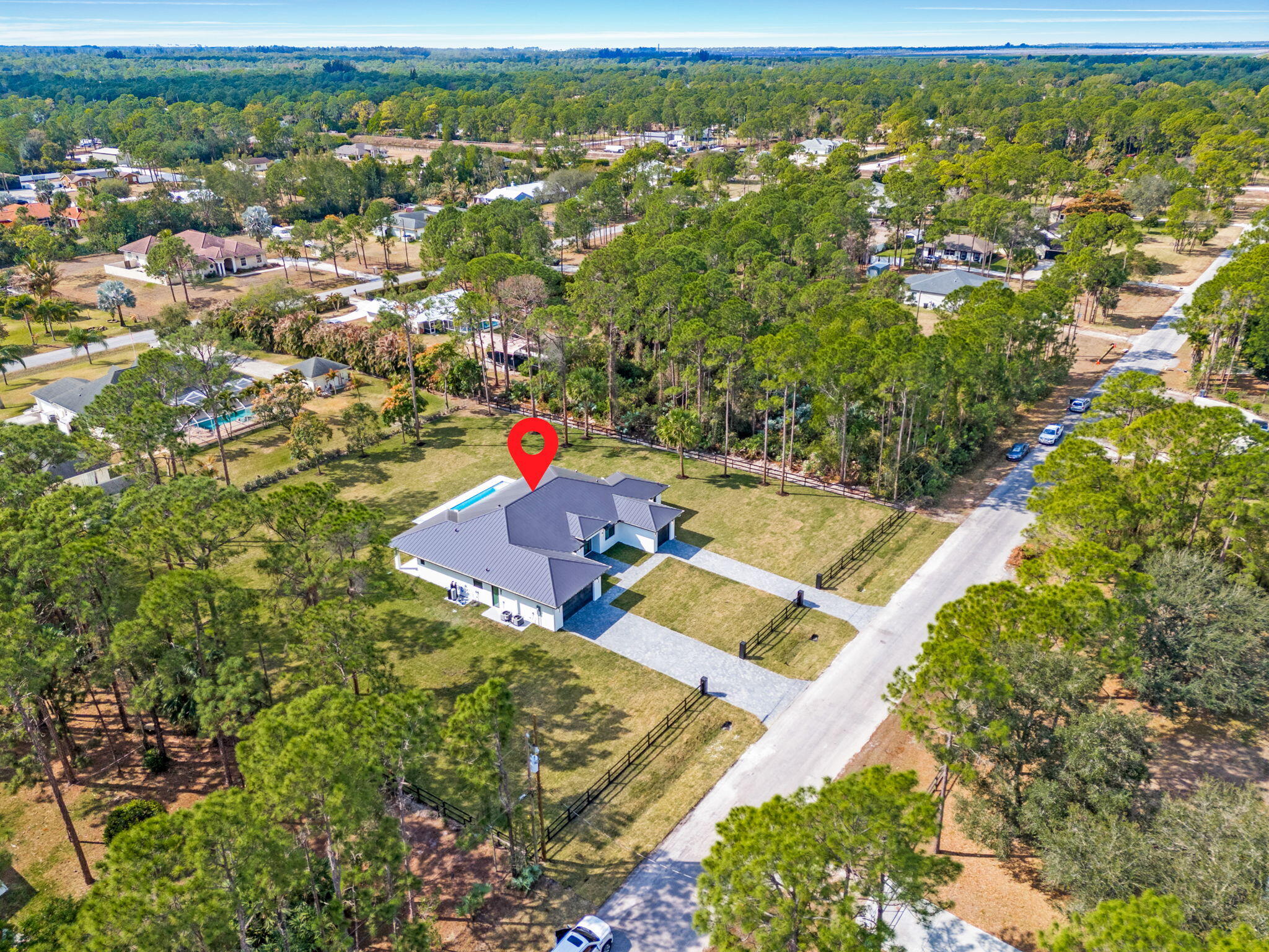 16818 78th Road North The Acreage, FL 33470 - Photo 68 of 75 66-web-or-mls-DJI_20260211110935_0843_D-