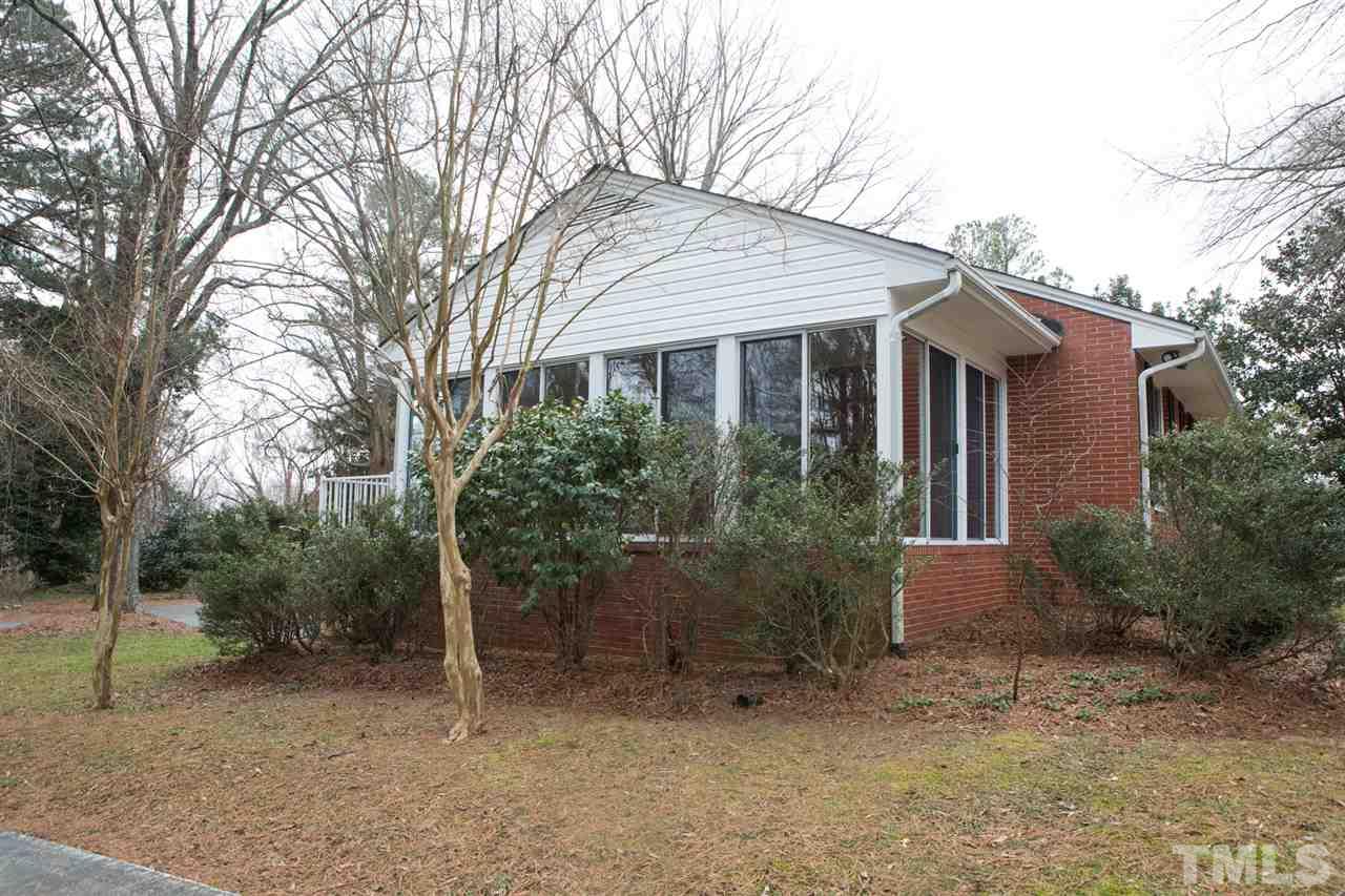 314 Cates Street Roxboro, NC 27573 - Photo 2 of 19 a view of a house with a yard