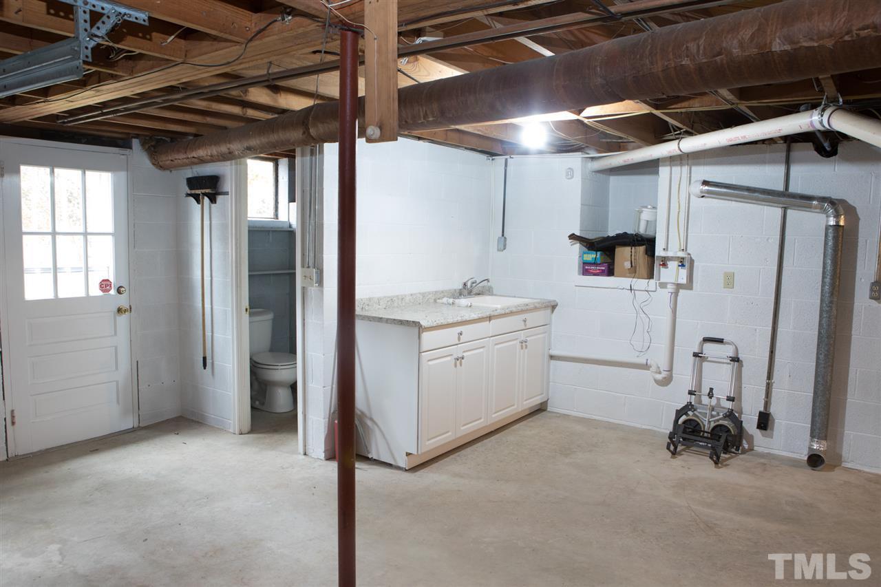 314 Cates Street Roxboro, NC 27573 - Photo 18 of 19 a utility room with dryer and washer