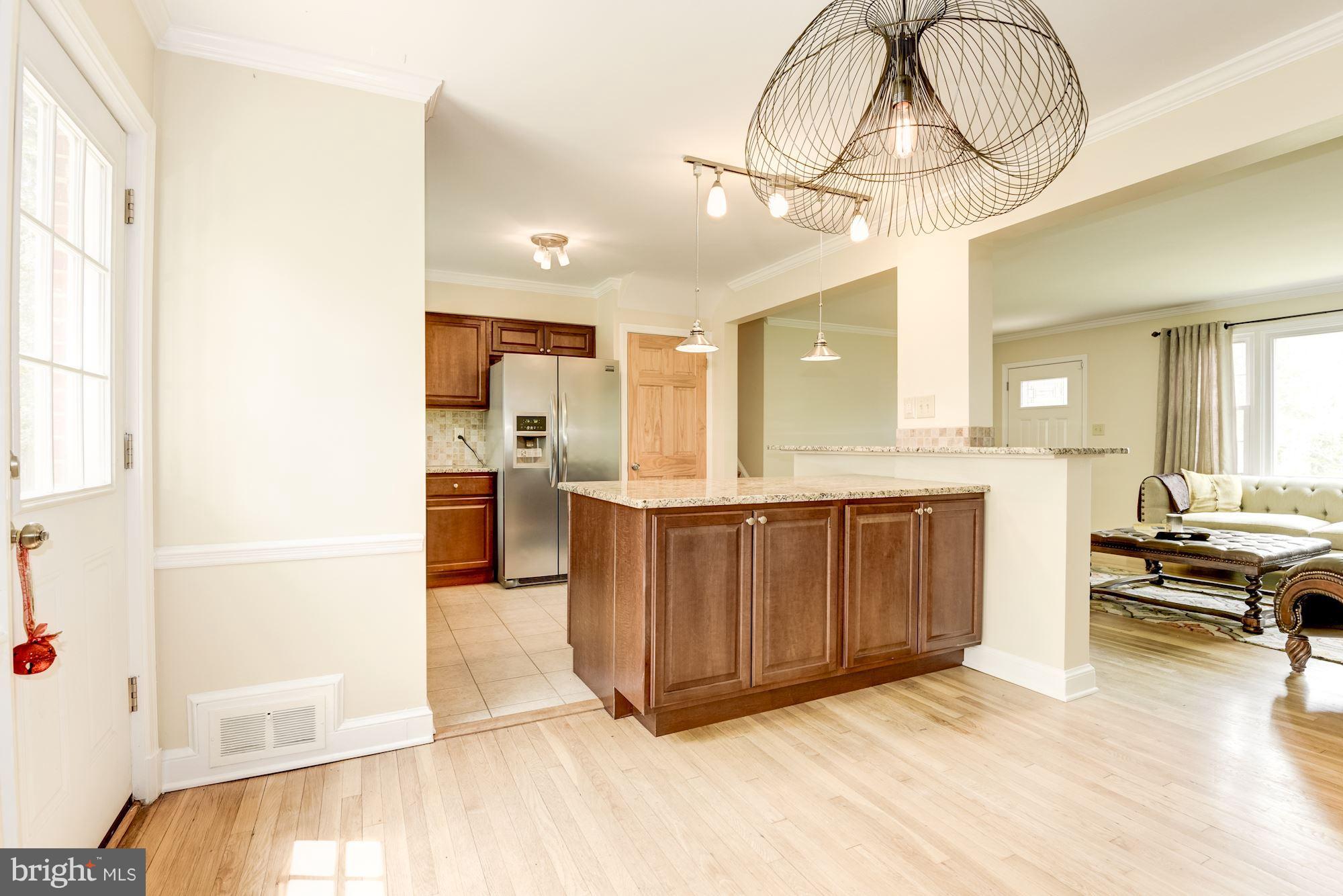6906 Edgerton Lane Springfield, VA 22150 - Photo 9 of 30 Dining Room view to kitchen and living spaces