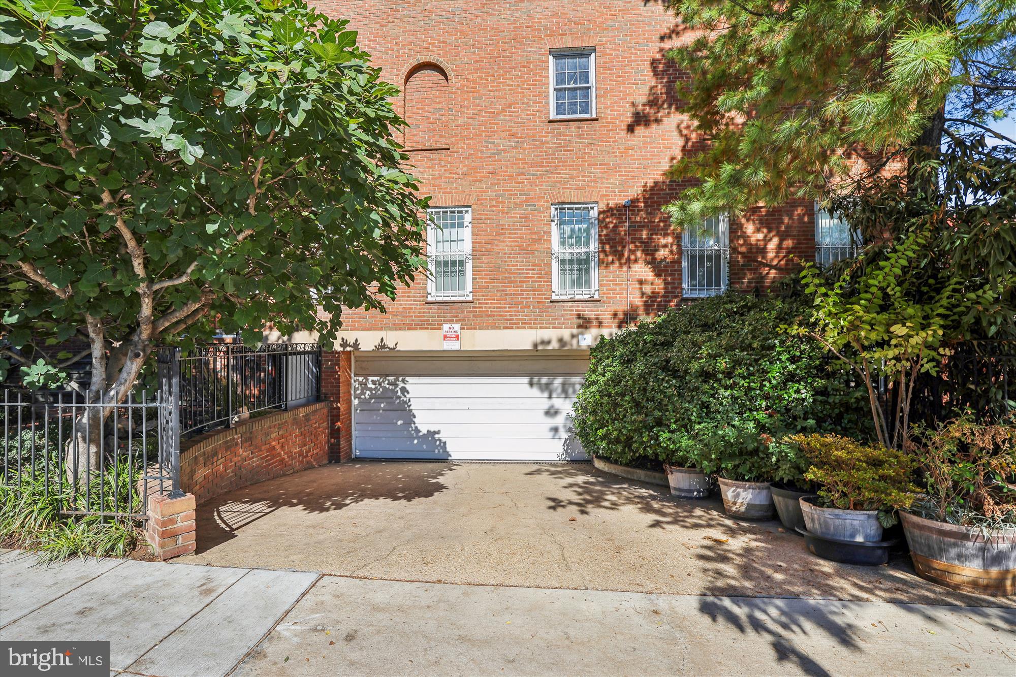 1803 T Street Northwest, Unit 3 Washington, DC 20009 - Photo 28 of 45 a front view of a house with a yard