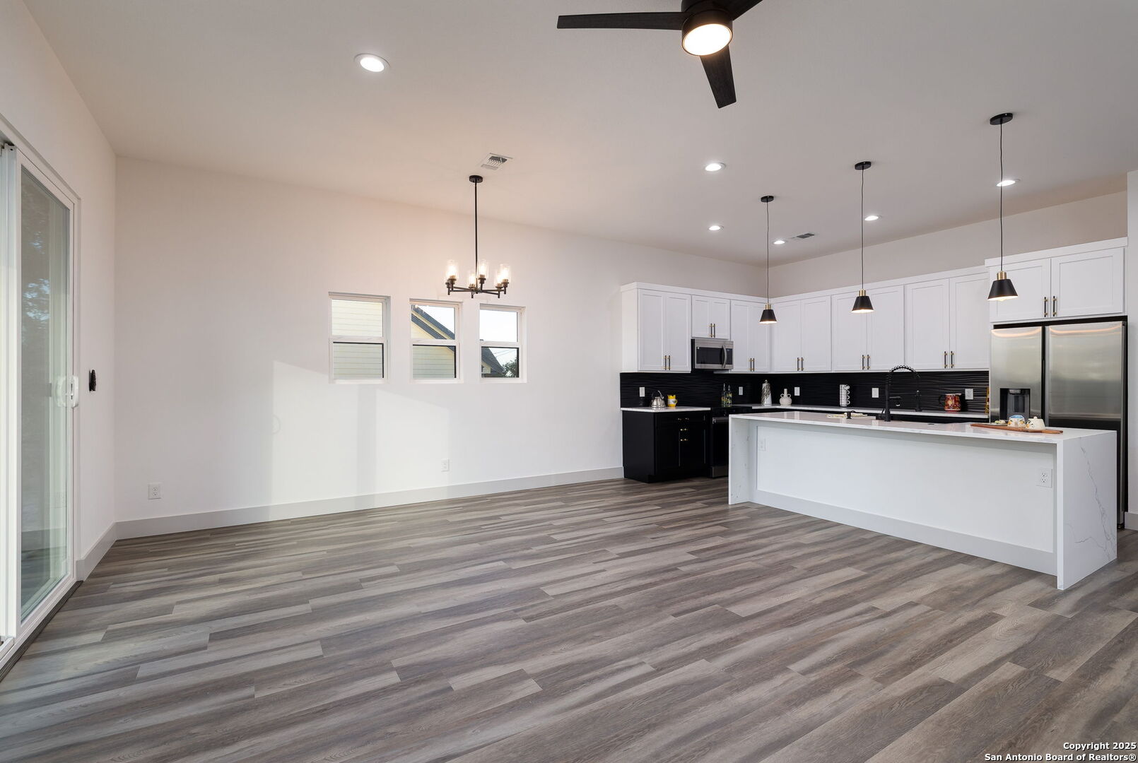 1210 Fernwood Road Fischer, TX 78623 - Photo 13 of 36 a view of kitchen with stove and cabinets