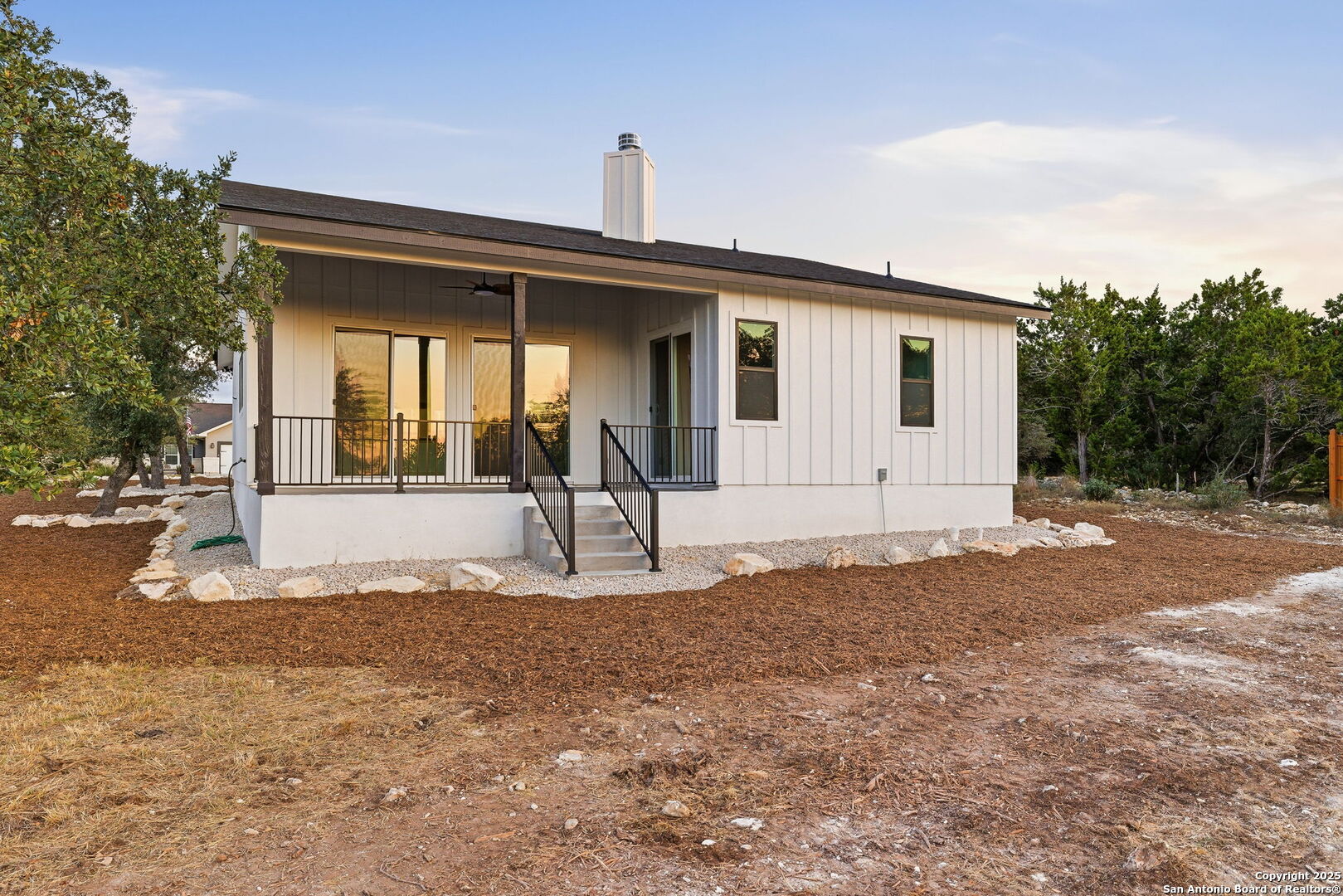 1210 Fernwood Road Fischer, TX 78623 - Photo 35 of 36 a front view of a house with a yard