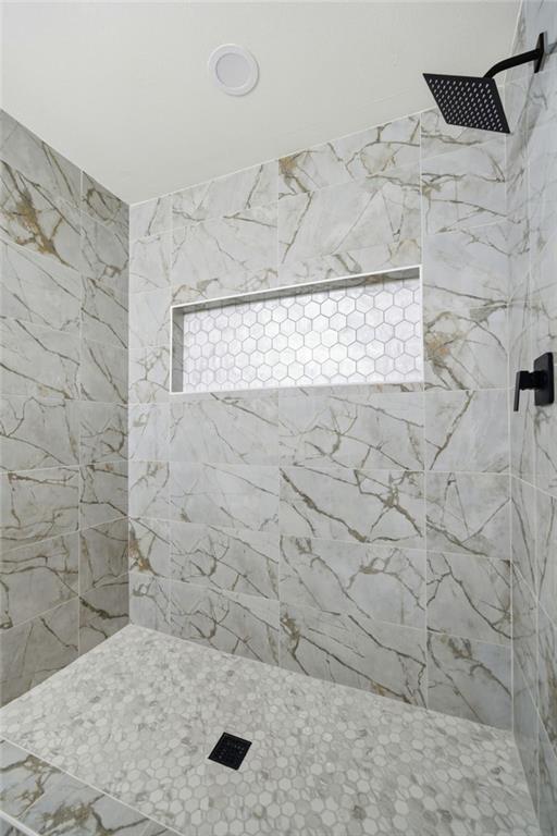 6807 Tralee Drive Lithia Springs, GA 30122 - Photo 25 of 36 a bathroom with a shower