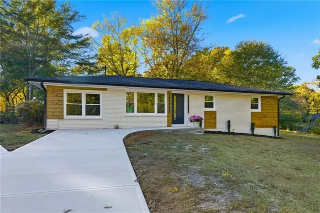 front view of a house with a yard