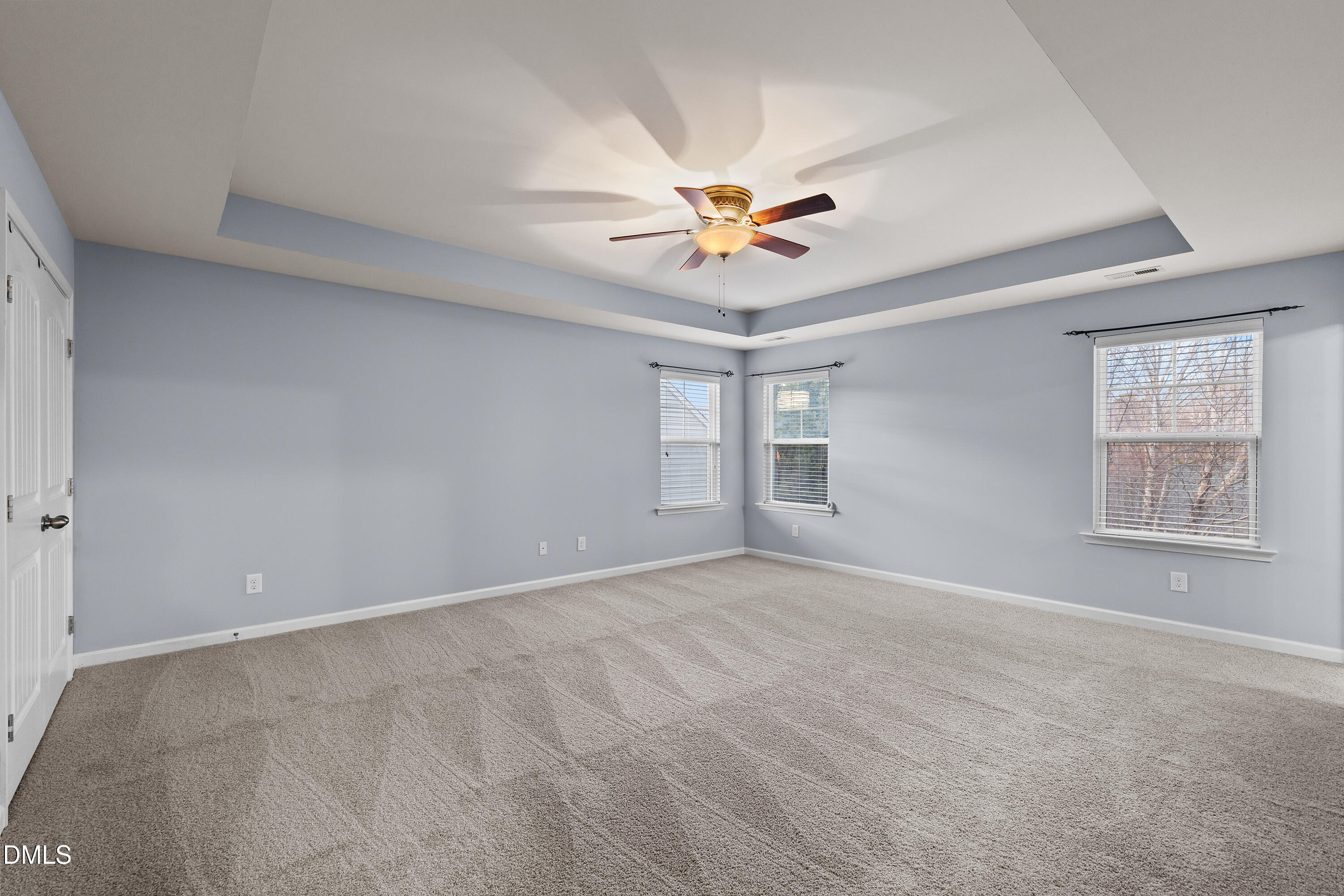 396 Naples Lane Clayton, NC 27527 - Photo 15 of 33 a view of an empty room with a window