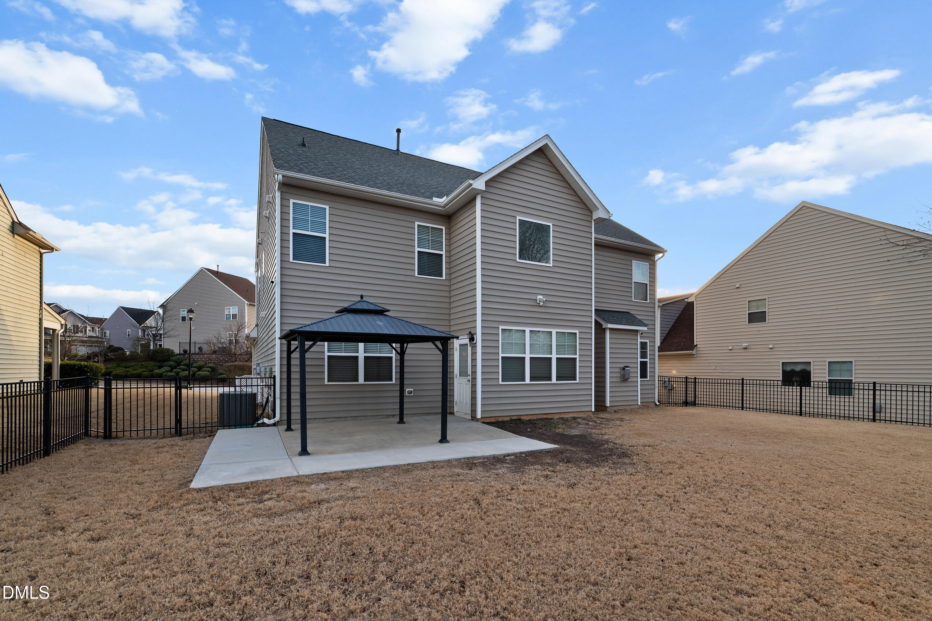396 Naples Lane Clayton, NC 27527 - Photo 2 of 33 a front view of a house with a garage
