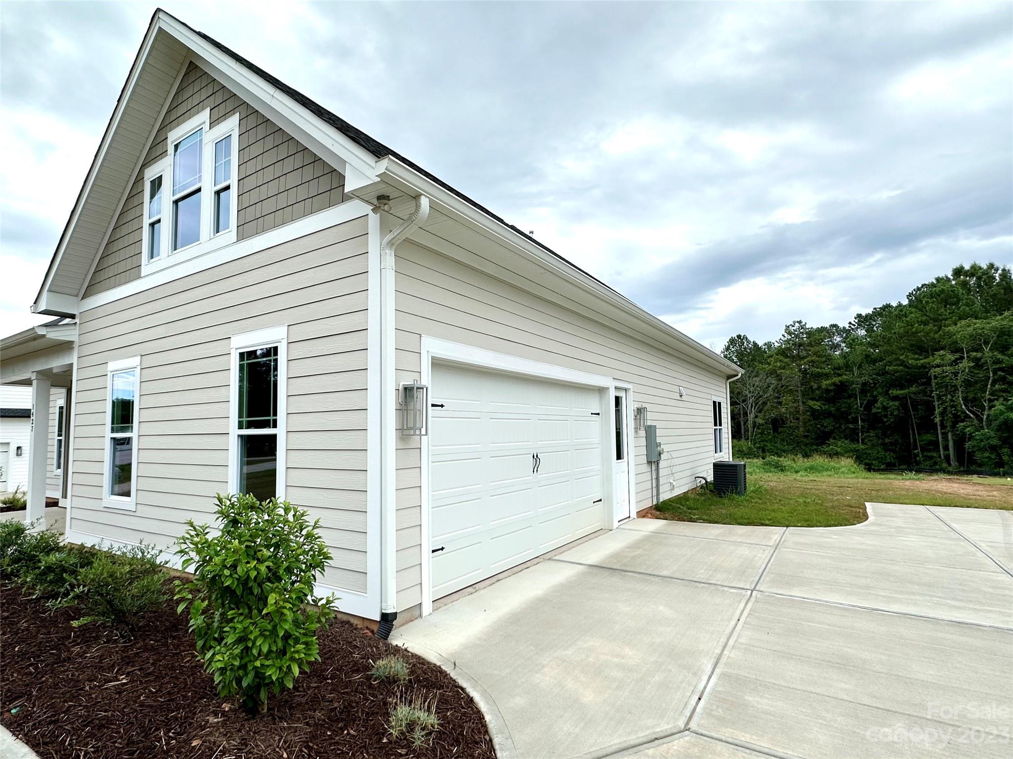 1427 Oak Park Road Rock Hill, SC 29730 - Photo 2 of 29 a view of a house with backyard and trees
