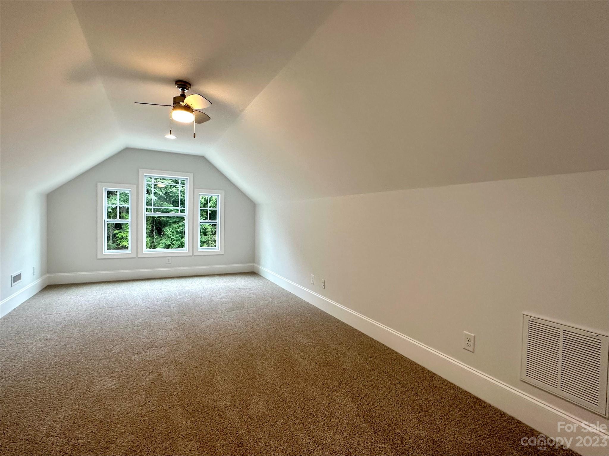 1427 Oak Park Road Rock Hill, SC 29730 - Photo 23 of 29 an empty room with a window and a ceiling fan