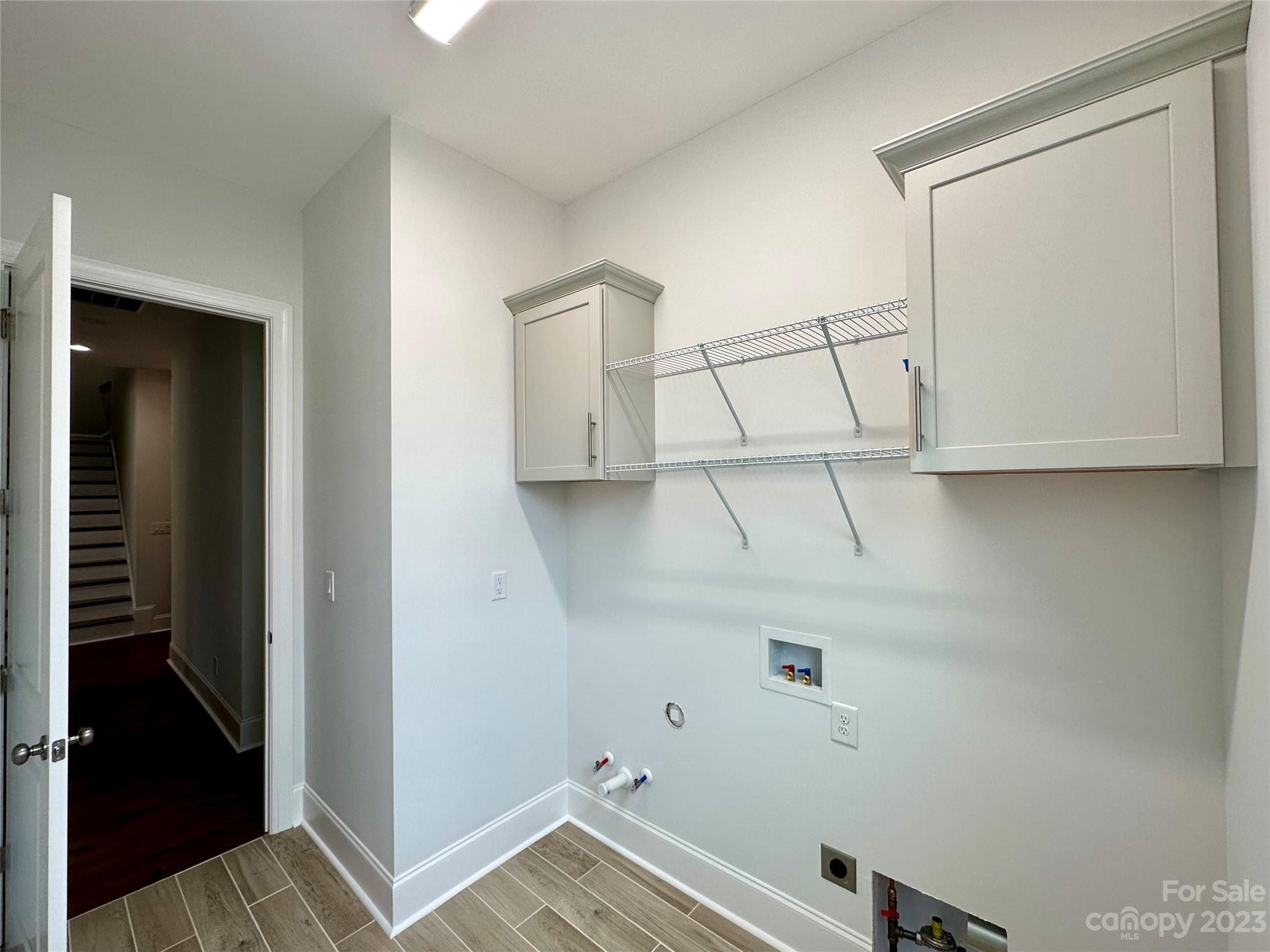 1427 Oak Park Road Rock Hill, SC 29730 - Photo 25 of 29 a view of storage and utility room with racks on the wall