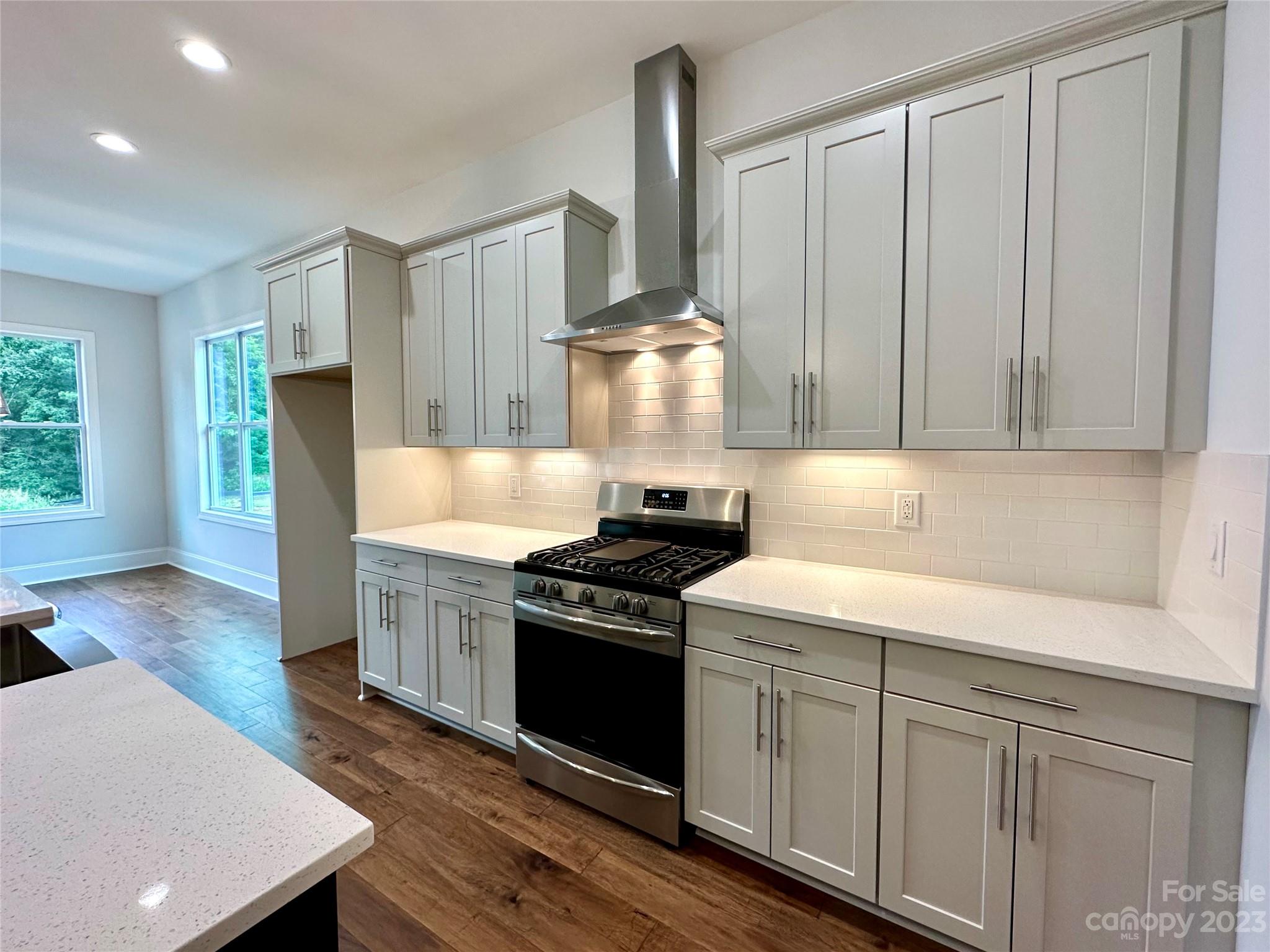 1427 Oak Park Road Rock Hill, SC 29730 - Photo 9 of 29 a kitchen with a stove and a refrigerator
