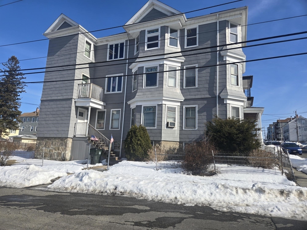 600 Charles Street, Unit 3 Fall River, MA 02724 - Photo 2 of 8 a view of a building with a yard