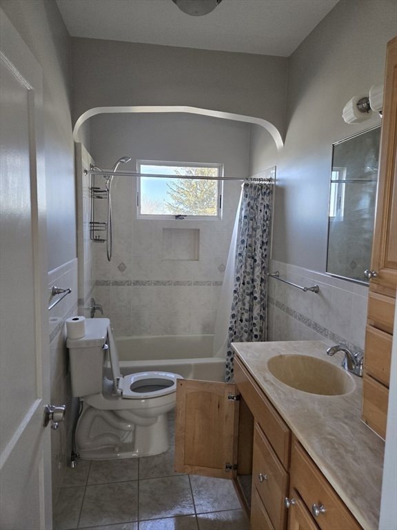 600 Charles Street, Unit 3 Fall River, MA 02724 - Photo 5 of 8 a bathroom with a sink a toilet and shower