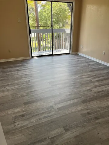 a car parked in front of a house