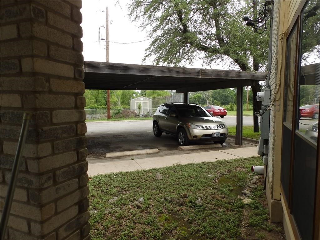 8500 Lyndon Lane, Unit B Austin, TX 78729 - Photo 21 of 22 a car parked in front of a house