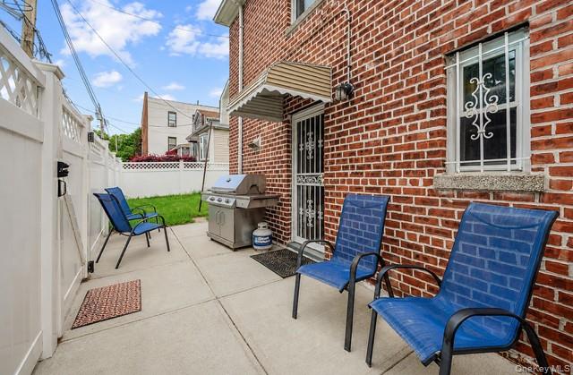 1103 Rhinelander Avenue Bronx, NY 10461 - Photo 24 of 34 Side entry way & patio