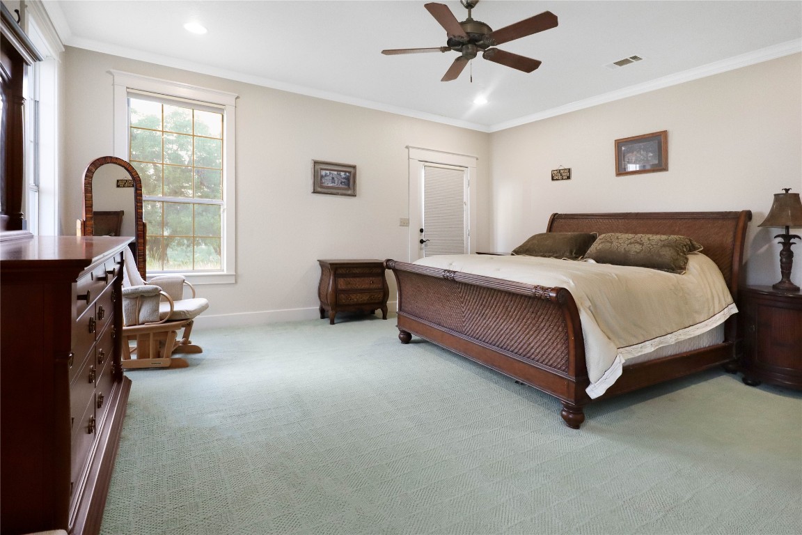 1428 Seven Spgs Drive Junction, TX 76849 - Photo 14 of 39 a bedroom with a bed couch and a window