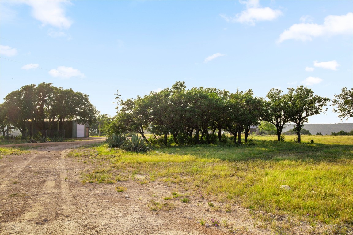 1428 Seven Spgs Drive Junction, TX 76849 - Photo 2 of 39 a view of a yard in front of the house