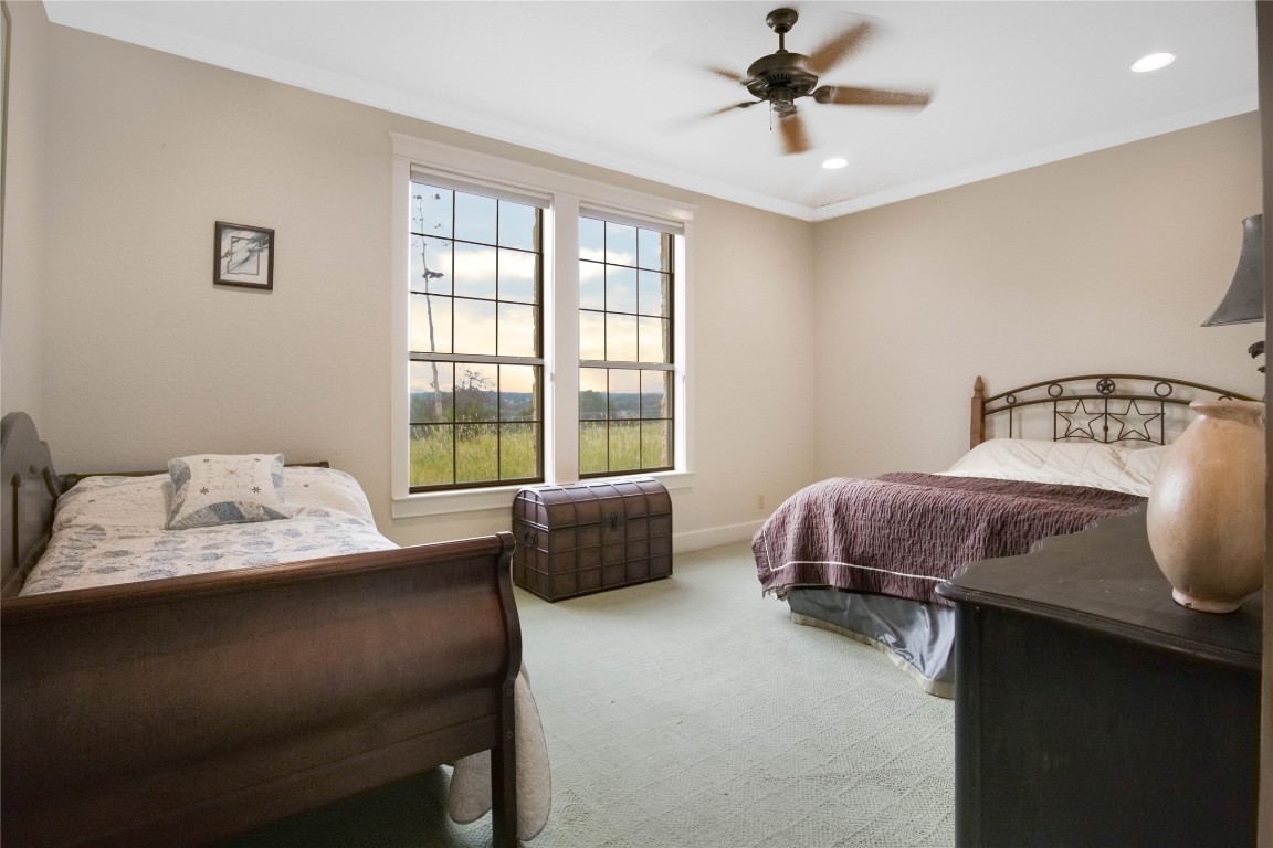 1428 Seven Spgs Drive Junction, TX 76849 - Photo 21 of 39 a bedroom with a bed and window