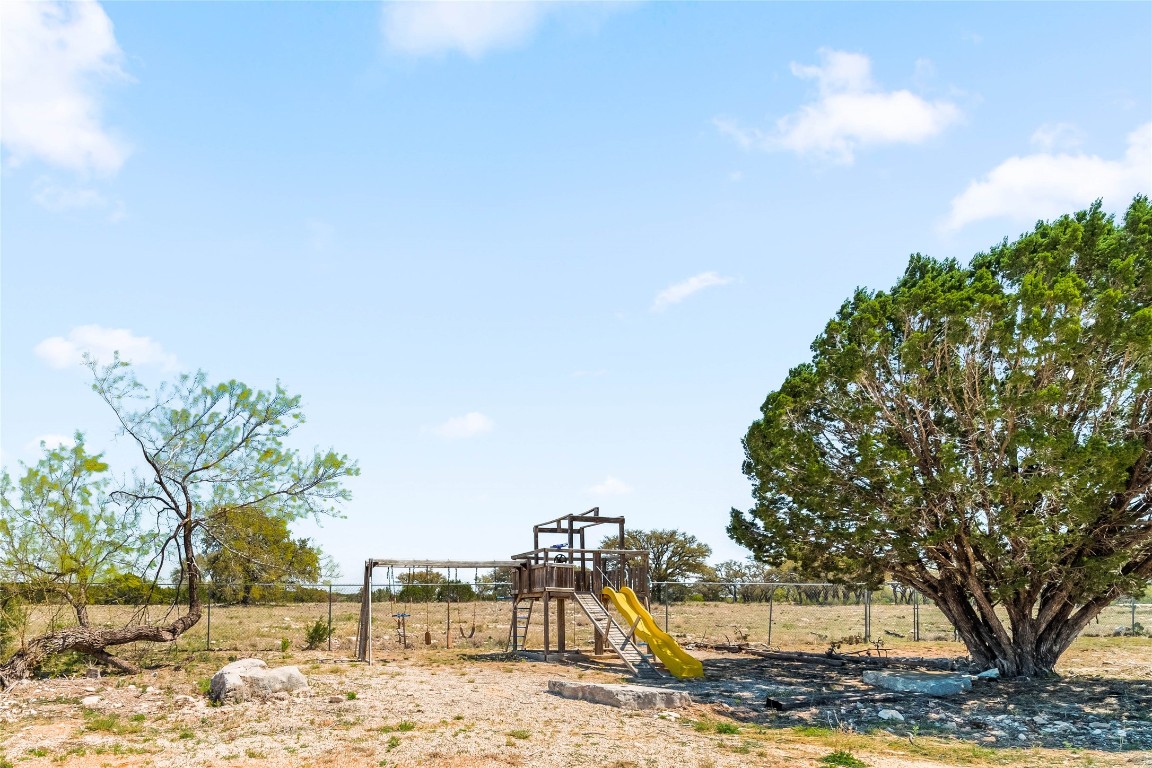 1428 Seven Spgs Drive Junction, TX 76849 - Photo 32 of 39 a view of a yard with an trees