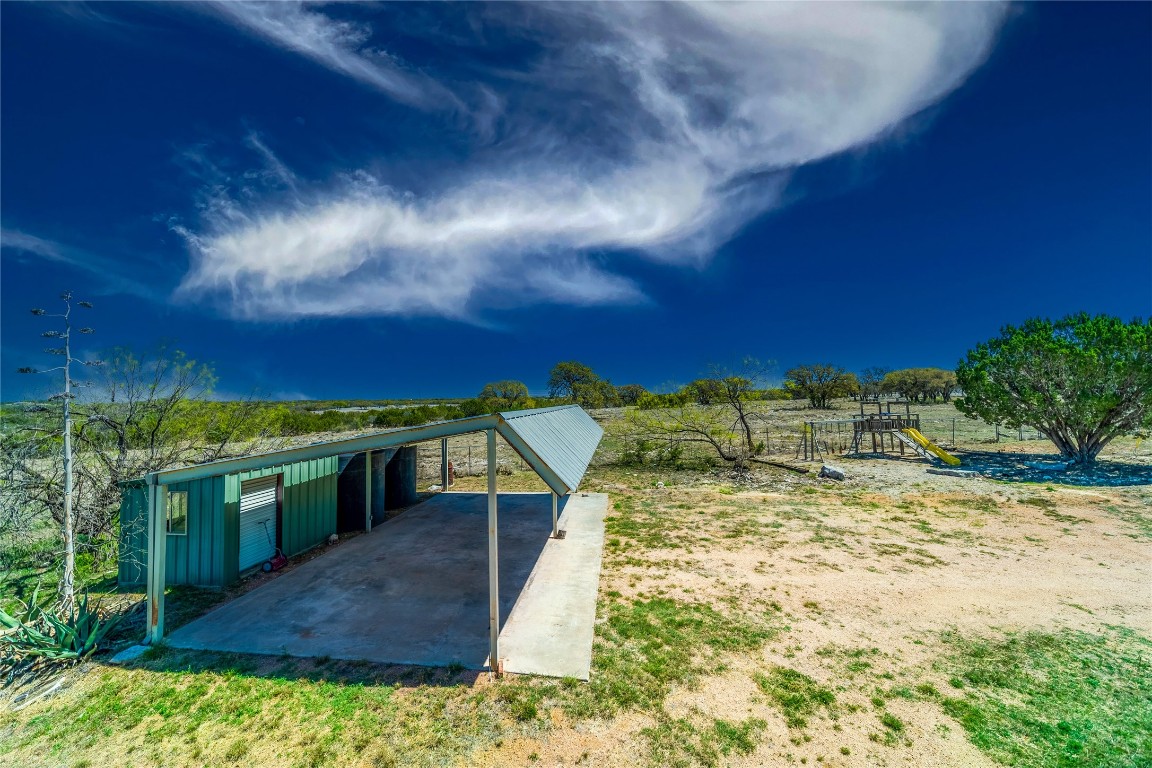 1428 Seven Spgs Drive Junction, TX 76849 - Photo 33 of 39 a view of a swimming pool with a patio