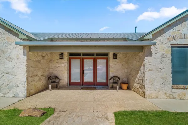 a front view of a house with patio
