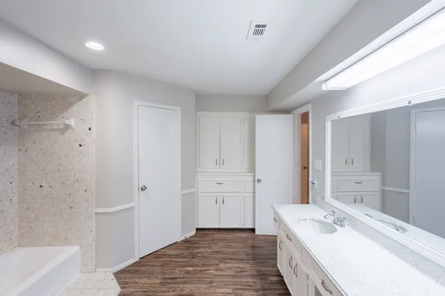 a bathroom with a bathtub