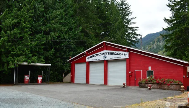 a view of a lake with a yard