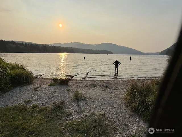 a view of a lake with a mountain in the background