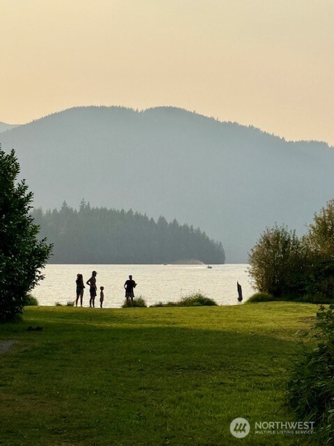 954 Kingsview Lane Sedro-Woolley, WA 98284 - Photo 40 of 40 a view of a lake with a mountain in the background