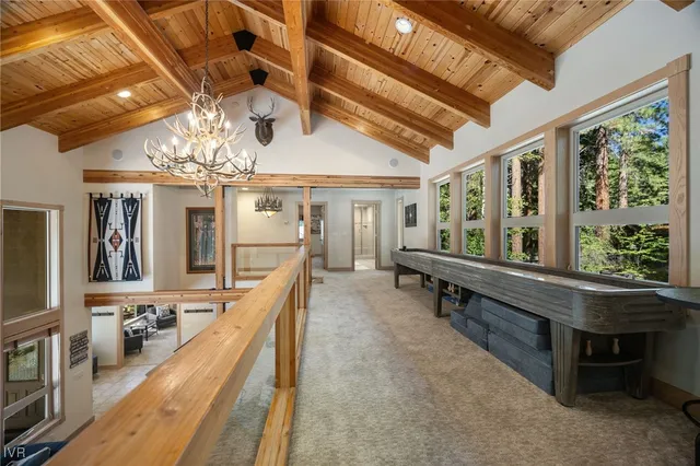 a bath tub sitting in a bathroom next to a window