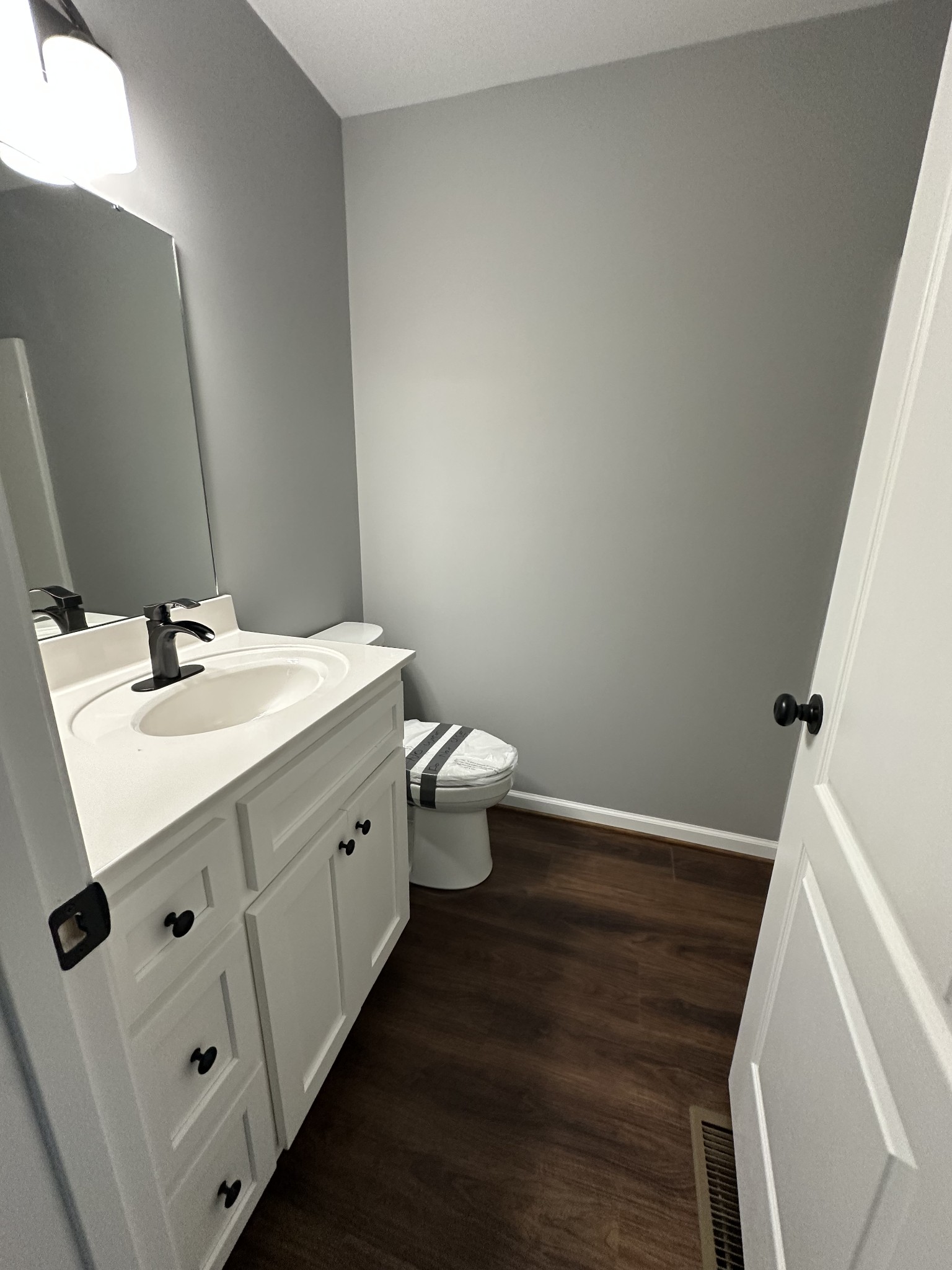 163 Rigling Road Loretto, TN 38469 - Photo 18 of 22 a bathroom with a sink and a mirror