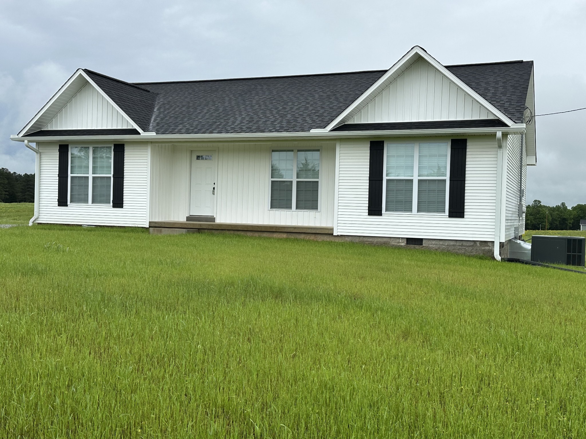 163 Rigling Road Loretto, TN 38469 - Photo 10 of 22 a front view of a house with a yard