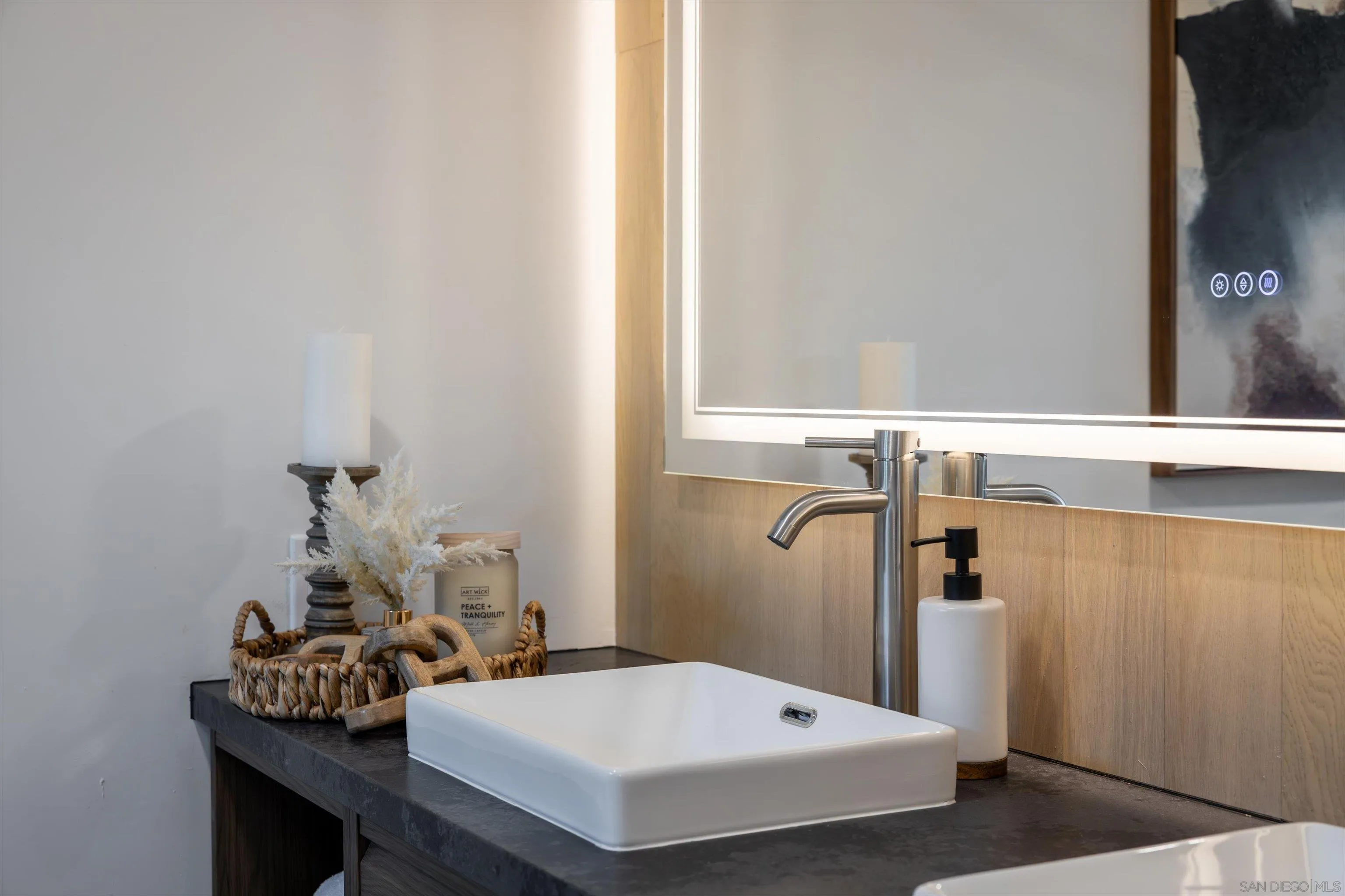 4640 Waverly Road Oceanside, CA 92056 - Photo 24 of 49 a bathroom with a sink and a mirror