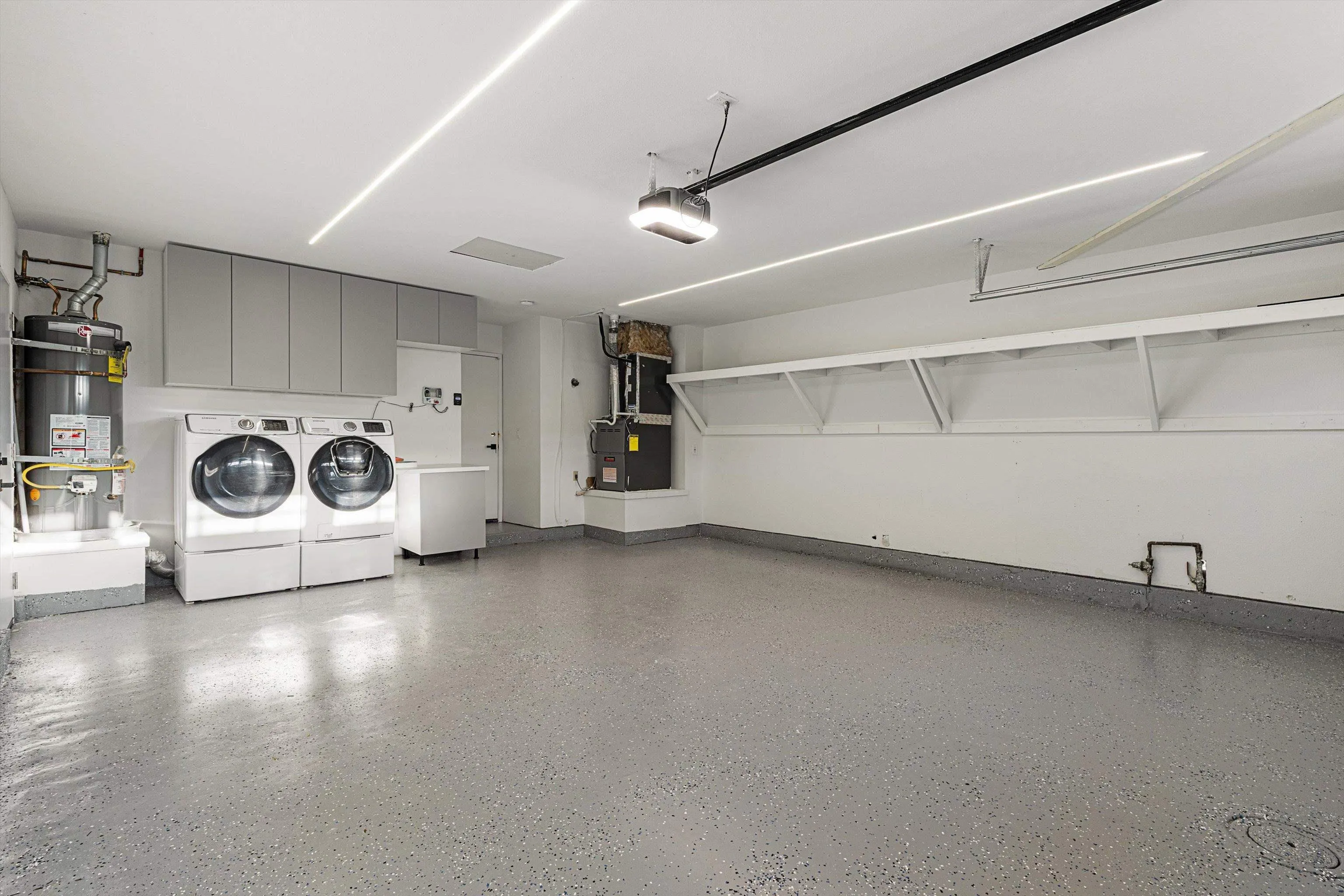 4640 Waverly Road Oceanside, CA 92056 - Photo 34 of 49 a view of a storage & utility room with washer and dryer